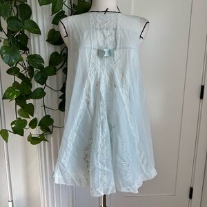 Vintage 70s babydoll slip in the dreamiest pale blue.